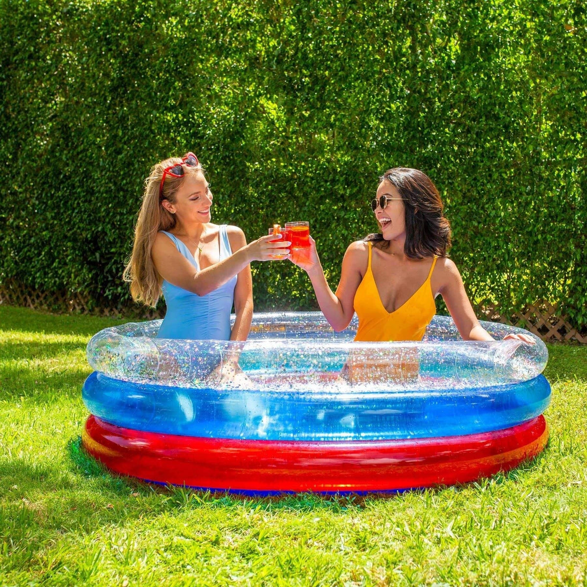 PoolCandy Inflatable 3-Ring Glitter Sunning Pool - Red, Blue, and Clear