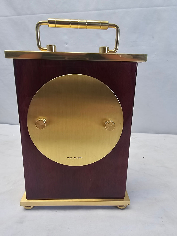 Howard Miller Rosewood Bracket Tabletop Clock with Brass Accents